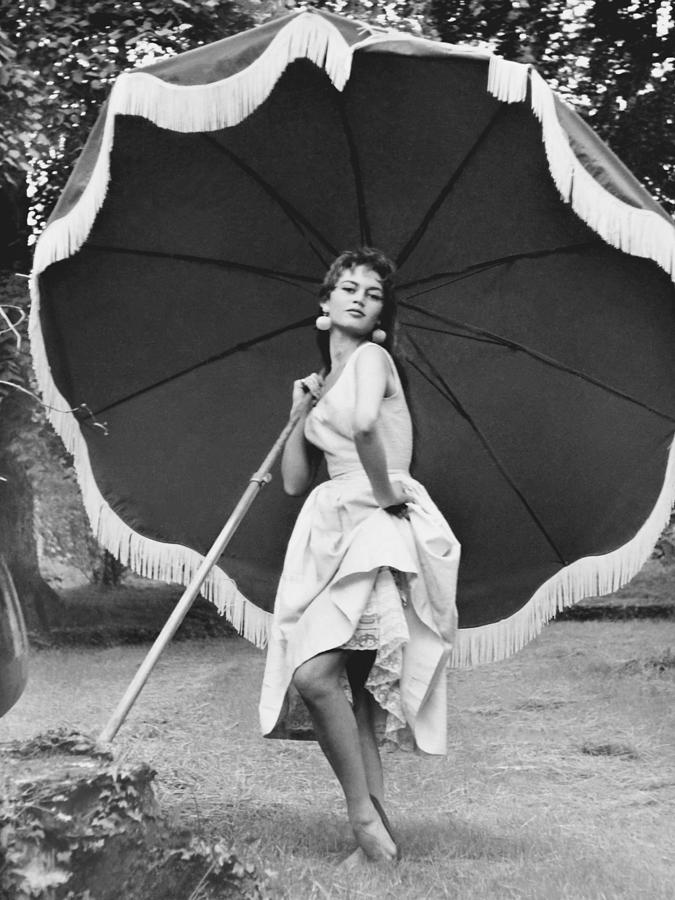 Hollywood Photograph - Brigitte Bardot With Umbrella by Globe Photos