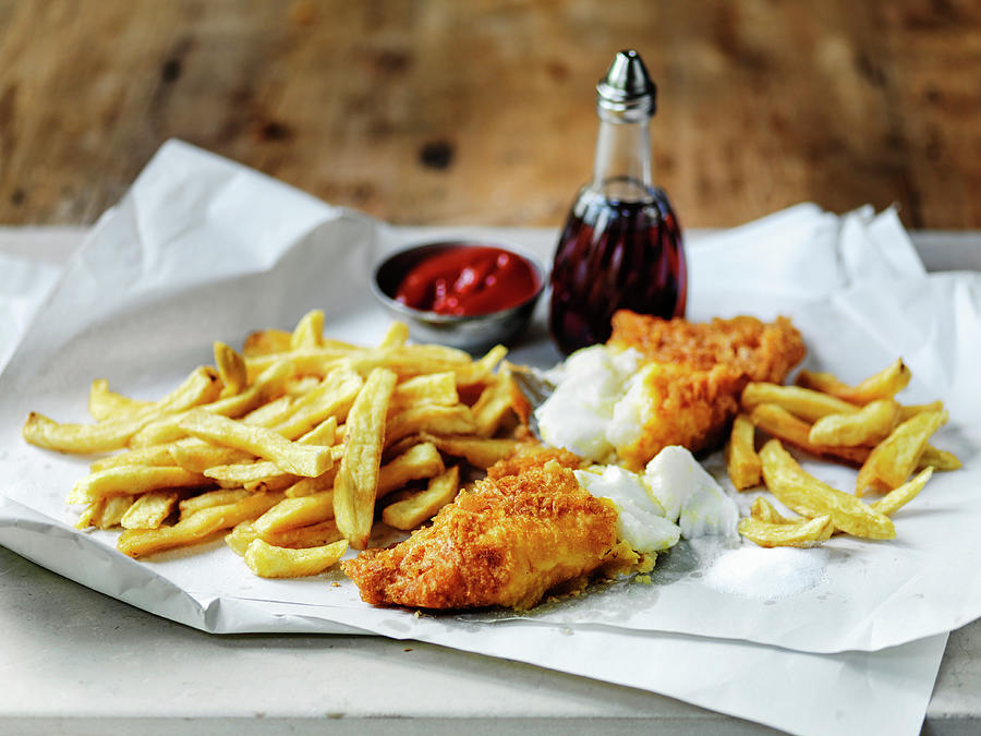 British Fish And Chips Withy Vinegar And Tomato Ketchup Photograph by