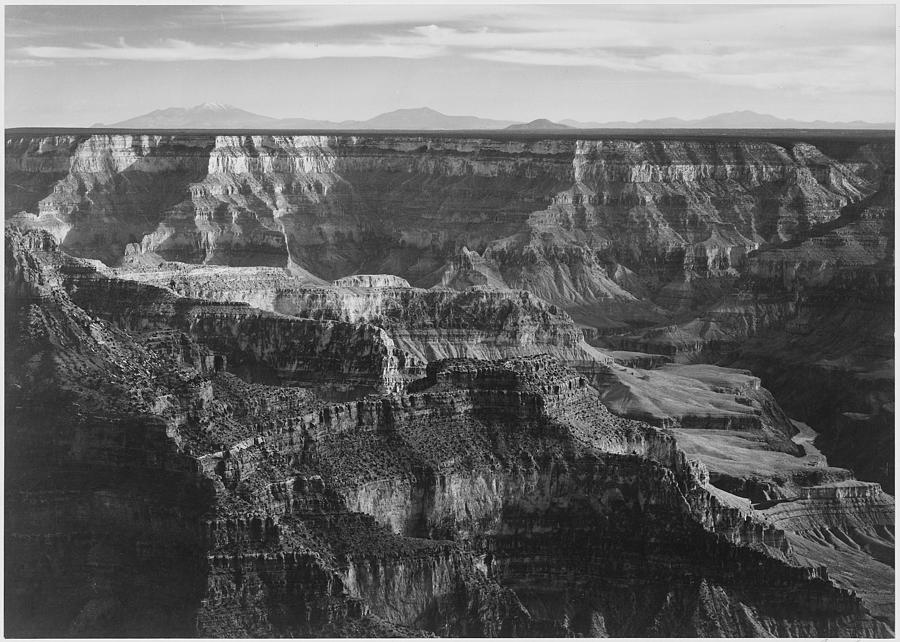 Broad view with detail of canyon horizon and mountains above Grand Canyon National Park Arizona. 1933 - 1942 Painting by Ansel Adams
