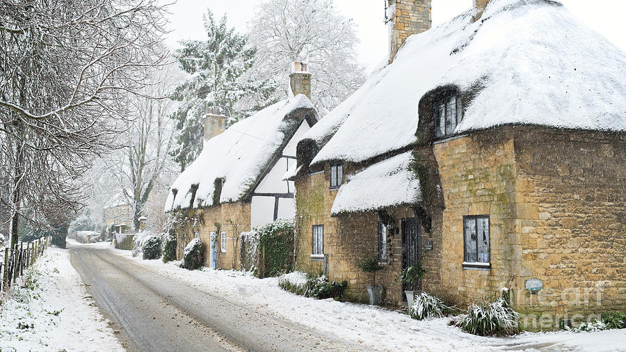 Broadway Thatched Cottages in the Winter Snow Photograph by Tim Gainey