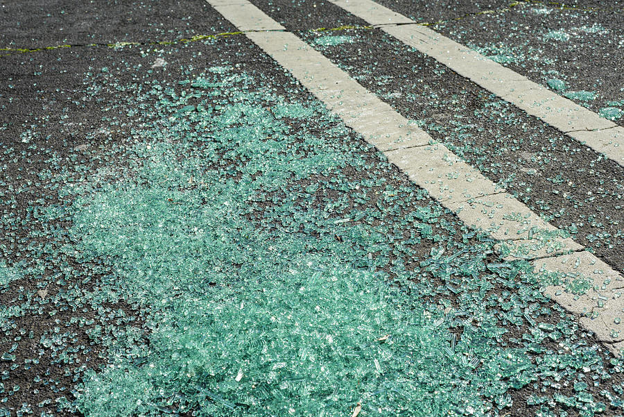 Broken Glass On Ground In Parking Lot Photograph by Cavan - Pixels