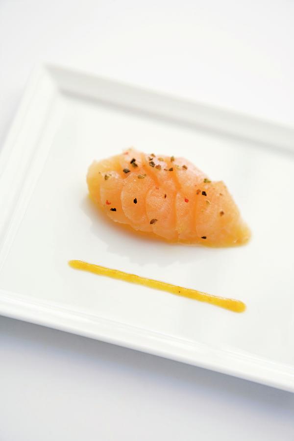Brook Trout Carpaccio With Orange And Colourful Pepper Photograph by Michael Wissing