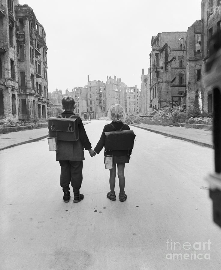 Brother And Sister Walking Down Street Photograph by Bettmann