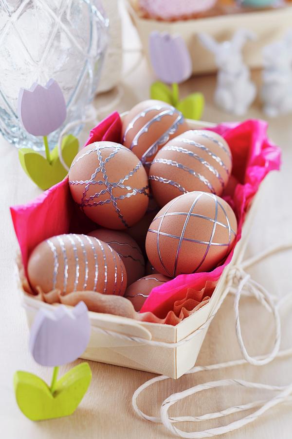 Brown Eggs Decorated With Silver Stickers In Chip Wood Box Photograph by Franziska Taube