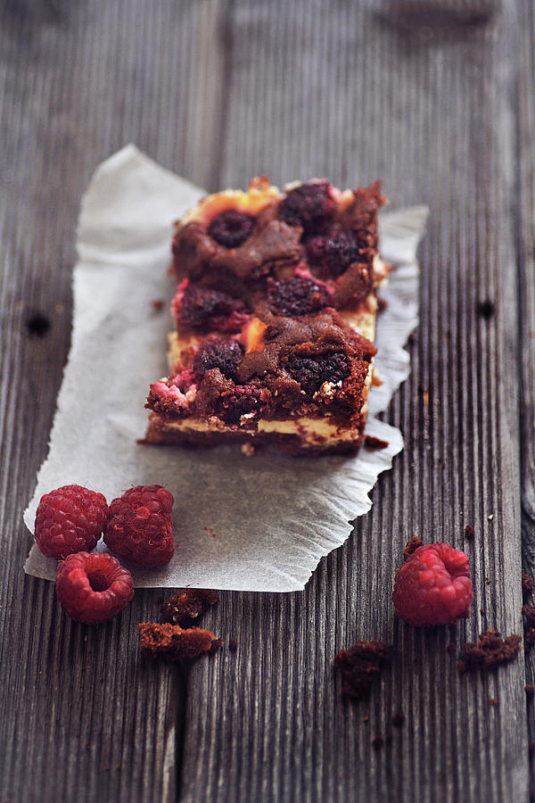 Brownie Cheese Cake With Raspberries Photograph by = Blue Spoon =