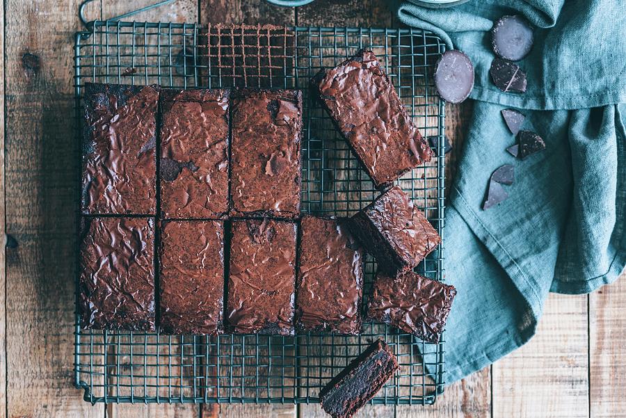 Brownies On A Cooling Rack Photograph by Hein Van Tonder