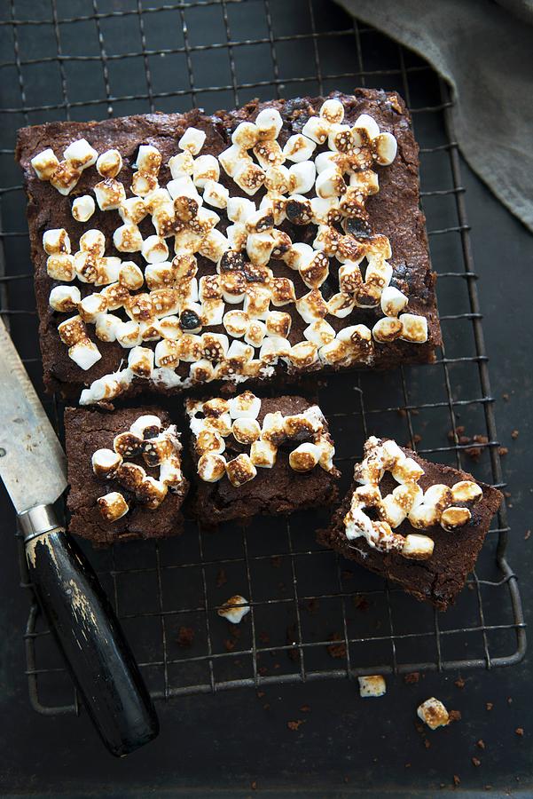 Brownies With Marshmallows On A Cooling Rack Photograph by Veronika Studer