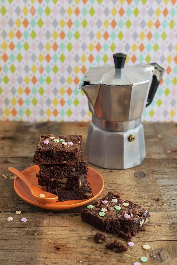 Brownies With Sugar Flowers And An Espresso Jug Photograph by Sonia Chatelain