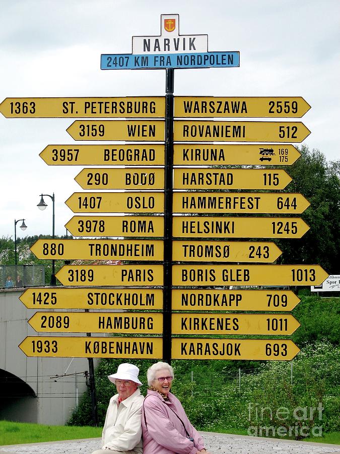 Bruce and Phyllis in Narvik signs to many places Photograph by Phyllis Kaltenbach
