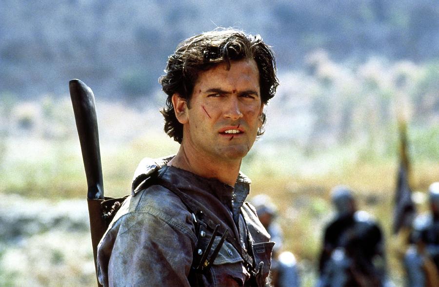 BRUCE CAMPBELL in ARMY OF DARKNESS -1992-. Photograph by Album