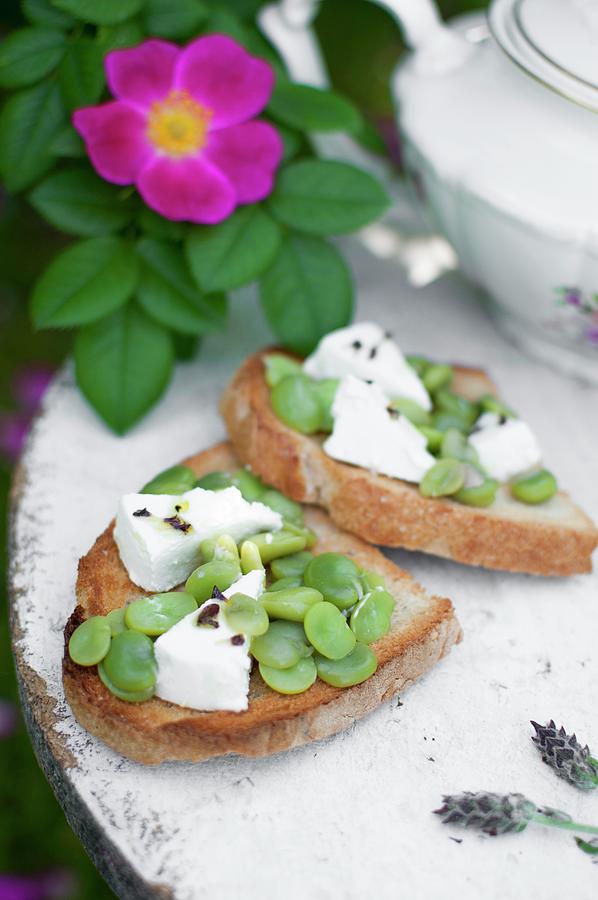 Bruschetta With Broad Beans, Goats Cheese, Lavender Flowers And Olive Oil Photograph by Kachel Katarzyna