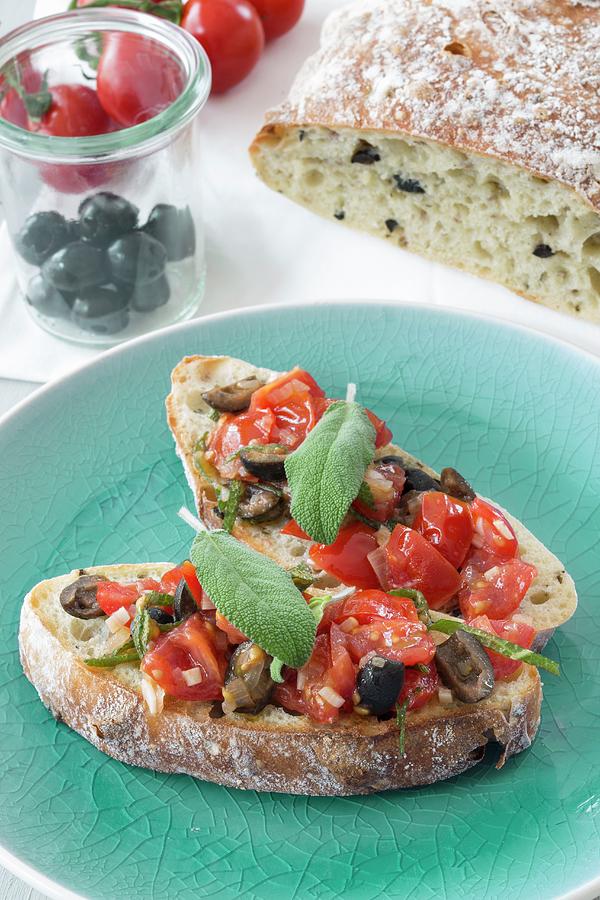 Bruschetta With Tomatoes, Olives And Sage Photograph by Jan Wischnewski