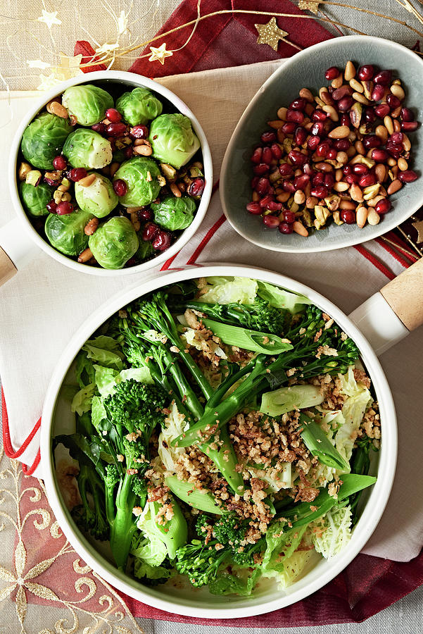 Brussels Sprouts, Savoy Cabbage And Broccoli With Pomegranate Seeds, And Nuts For Christmas Photograph by Jonathan Short
