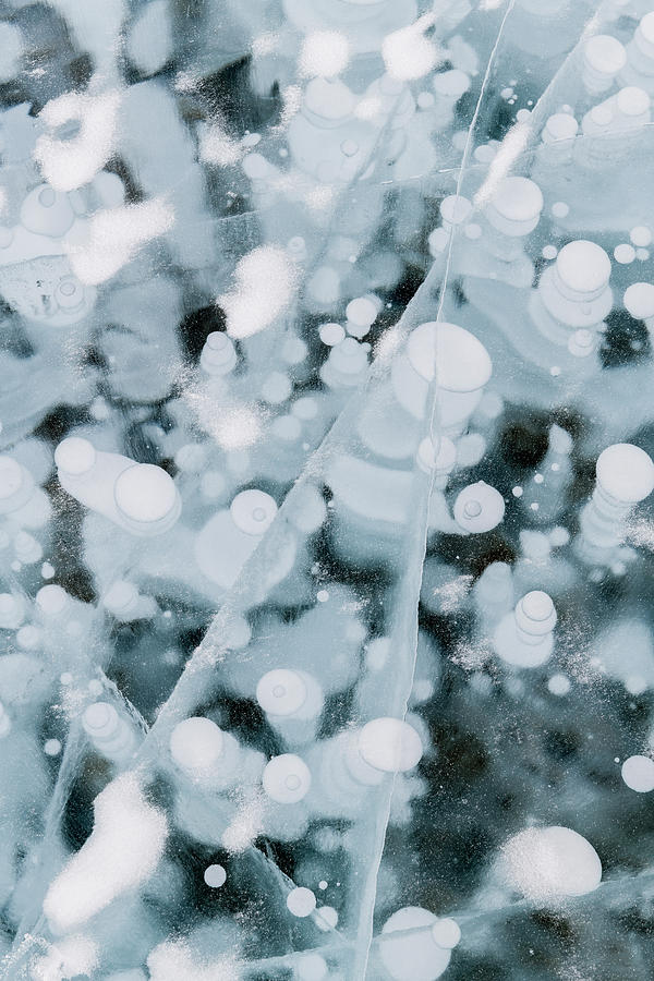 Bubble Pattern In Midwinter Ice Photograph by Panoramic Images - Pixels