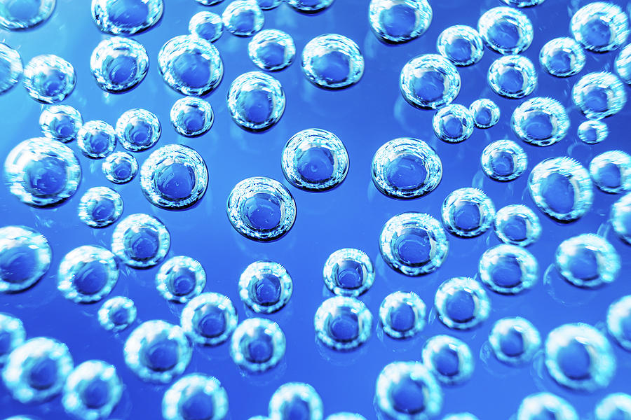 Bubbles Of Mineral Water Close-up. Macro Photo In Blue Shades. Backgro Photograph by Cavan Images