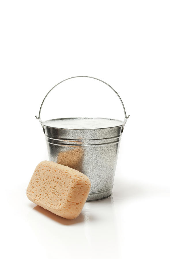 Bucket Of Water And Sponge For Cleaning Photograph by Graphicola
