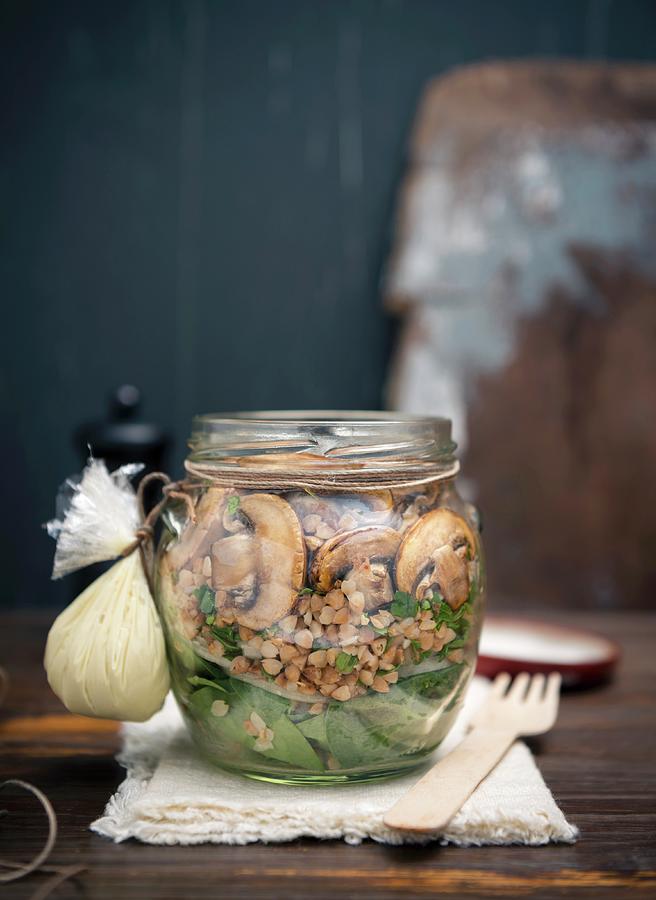 Buckwheat And Spinach Salad With Mushrooms And Vegan Mayo In A Glass Jar Photograph by Komar