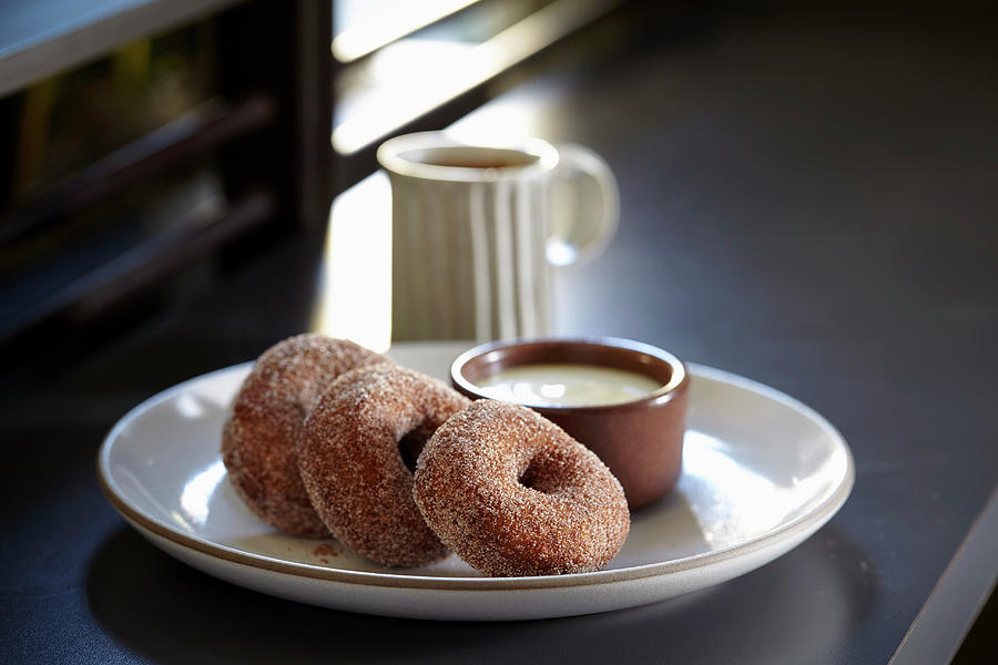 Buckwheat Doughnuts With Creme Anglaise And Coffee Photograph by Leo Gong