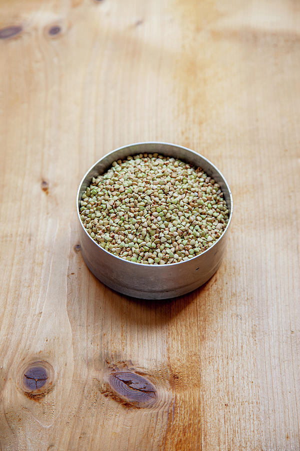 Buckwheat In A Round Metal Tin Photograph by Julia Skowronek