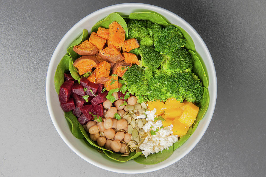 Buddha Bowl With Baby Spinach, Sweet Potatoes, Broccoli, Mango, Feta Cheese, Chickpeas And Beetroot Photograph by Jalag / Intosite Kitchengirls
