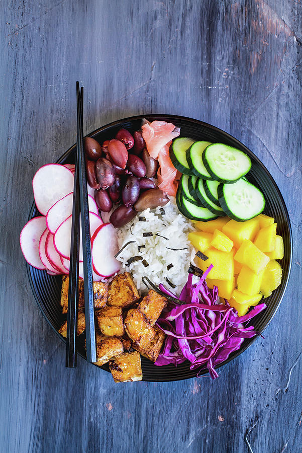Buddha Bowl With Basmati Rice, Mango, Fried Tofu, Purple Cabbage, Radishes, Olives, Pickled Ginger And Seaweed Photograph by Stephanie Frey