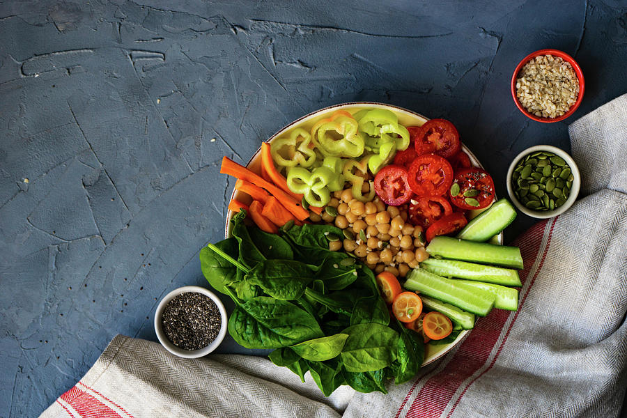 Buddha Bowl With Chickpea, Baby Spinach And Other Organic Vegetables On Concrete Background Photograph by Anna Bogush