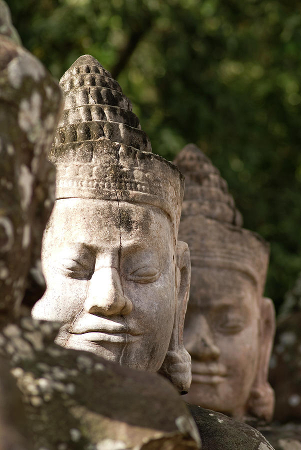 Buddha Head Sculpture In A Row Photograph by Joakimbkk