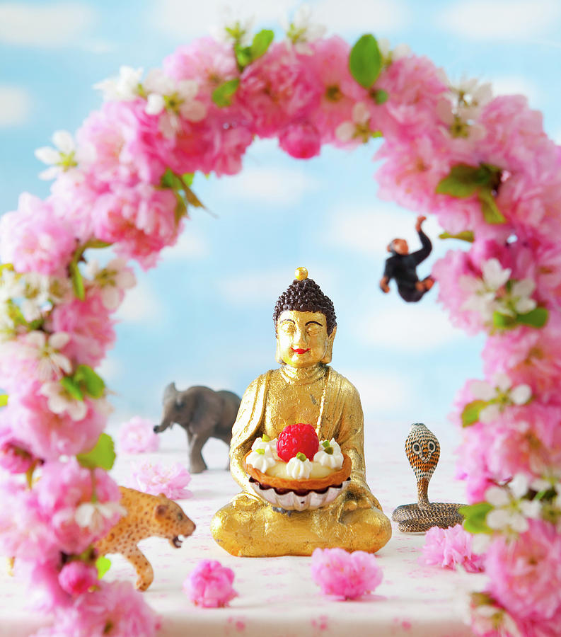Buddha With A Raspberry Tart And Flower Decoration Photograph by Udo Einenkel