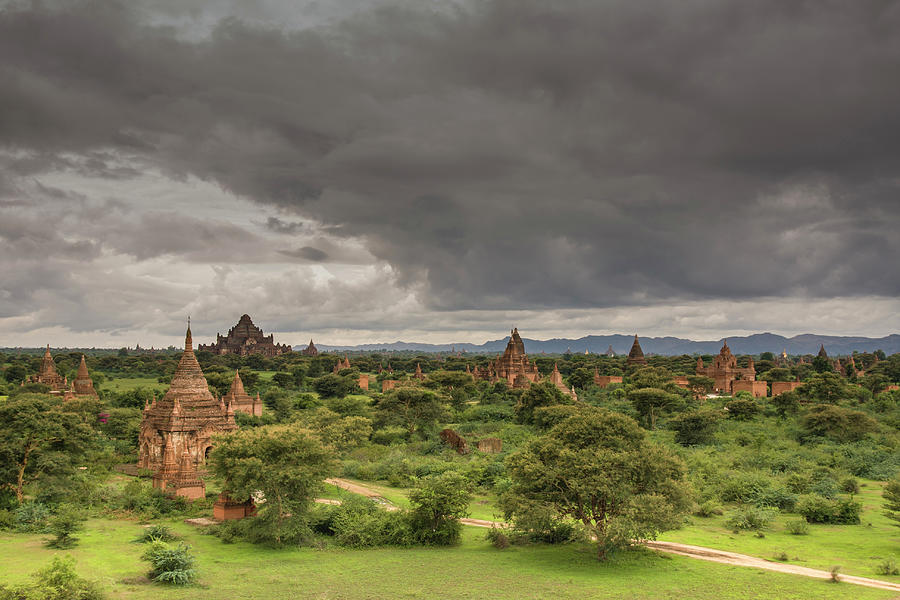 Buddhist Temples In Bagan With A Dark Photograph by © Santiago Urquijo