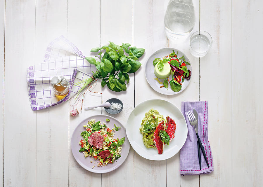 Bulgur Salad, Potato Puree And Basil On Table Photograph by Jalag ...