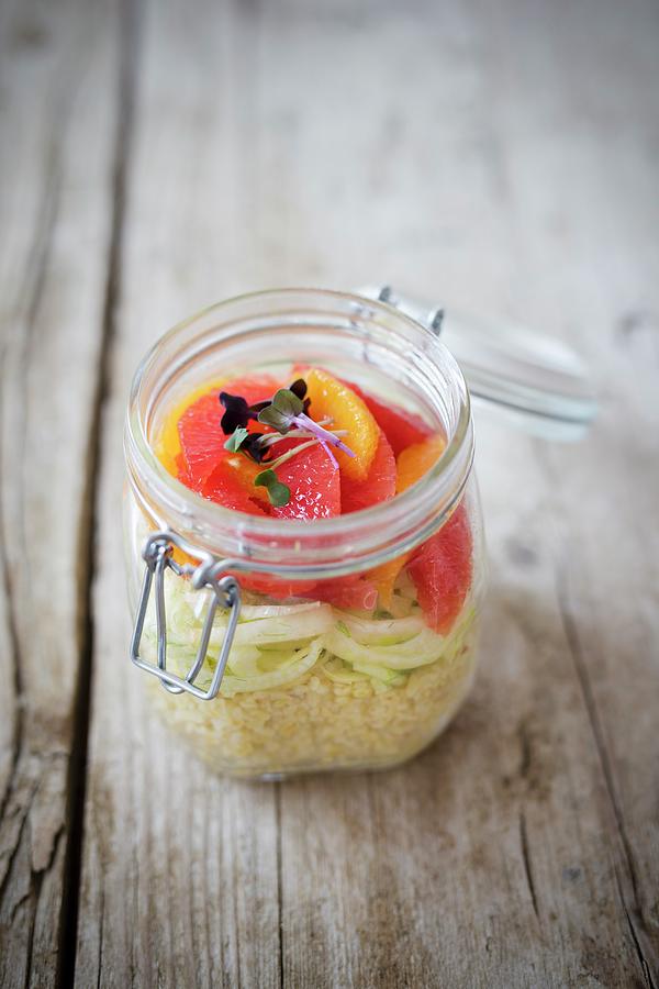 Bulgur Salad With Fennel And Citrus Fruits In A Glass Jar With Lid Photograph by Jan Wischnewski