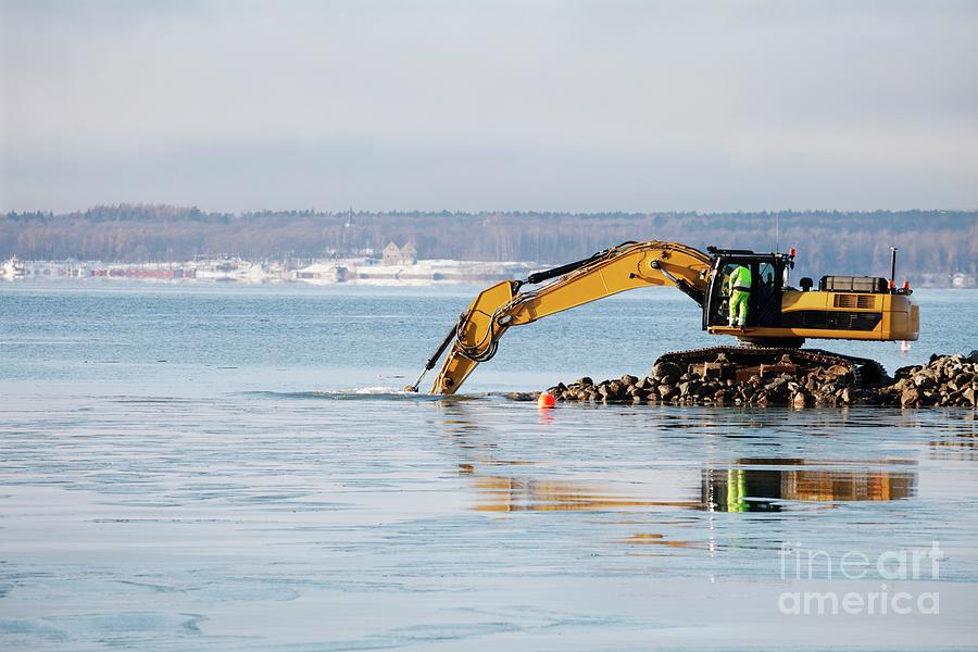 Bulldozer Photograph - Bulldozer Excavating Coast by Christian Lagerek/science Photo Library