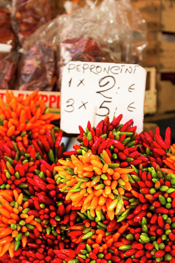 Bunches Of Fresh Chilli Peppers At A Market Photograph by Adel Bekefi