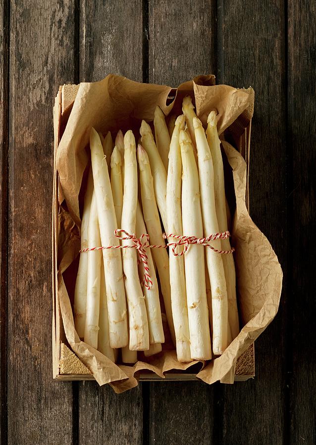 Bunches Of Fresh White Asparagus In A Crate Photograph by Ludger Rose