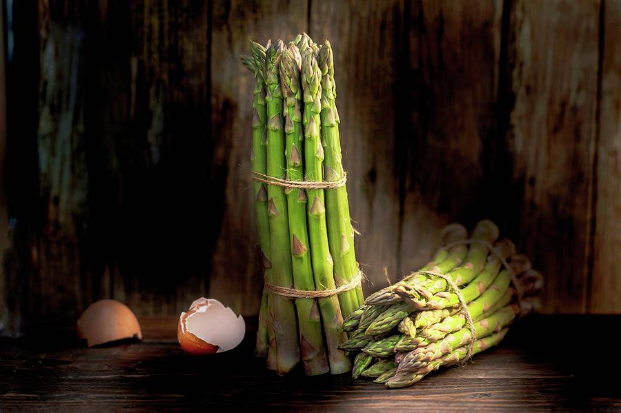 Bunches Of Green Asparagus And Eggshells Photograph by Piga & Catalano S.n.c.