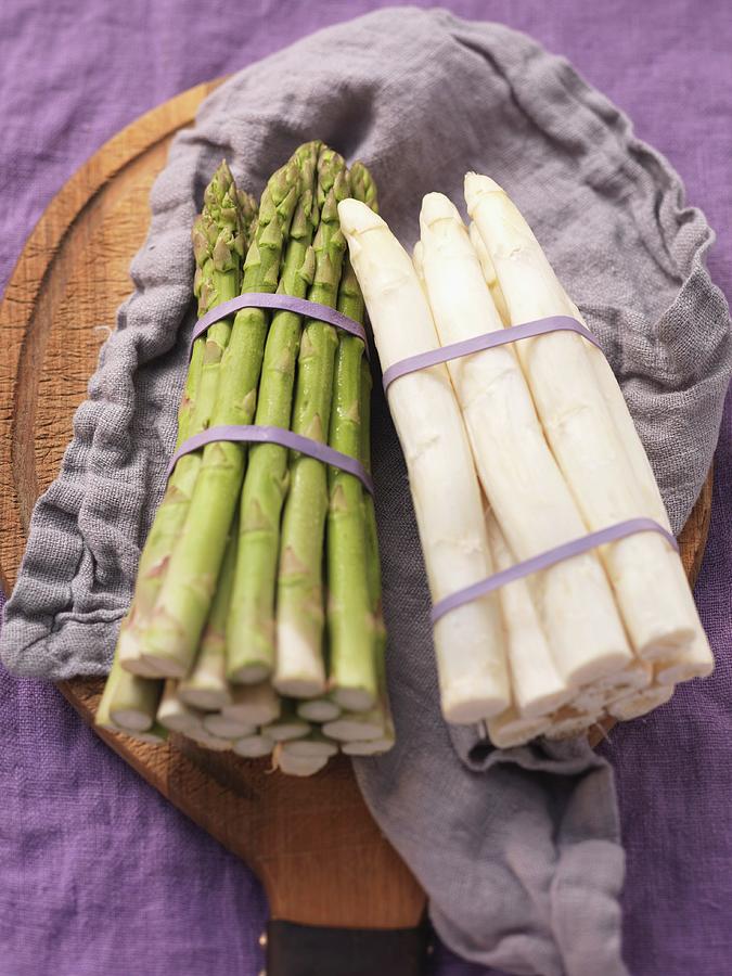 Bundles Of Green And White Asparagus Photograph by Eising Studio - Food Photo & Video
