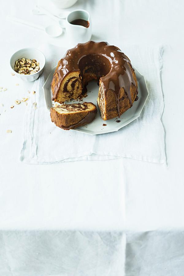 Bundt Cake With Baileys And Chocolate Glaze Photograph by Jalag / Wolfgang Schardt