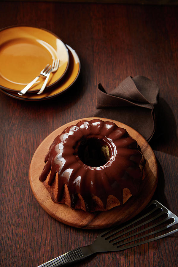 Bundt Cake With Chocolate Icing Photograph by Rafael Pranschke