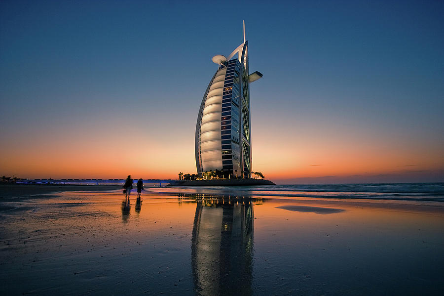 Burj Al Arab Hotel Reflected On Beach Photograph by Merten Snijders