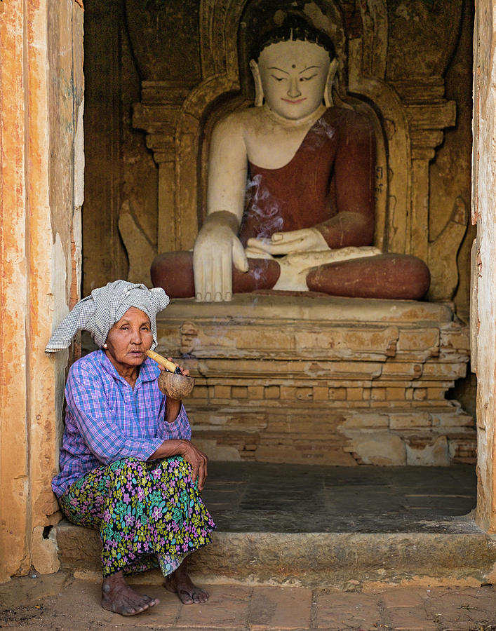 Burmese woman relaxing at temple entrance Photograph by Ann Moore