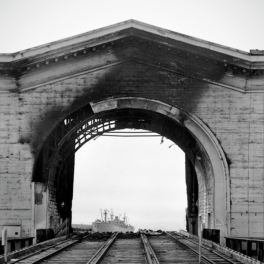 Burned Arch Over Railroad Tracks Photograph by Studio 642 Burned Arch Over Railroad Tracks Photograph by Studio 642