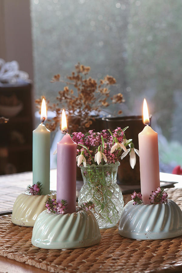Burning Candles In Bundt Cake Candle Holders With Snowdrops As Table Decoration Photograph by Regina Hippel