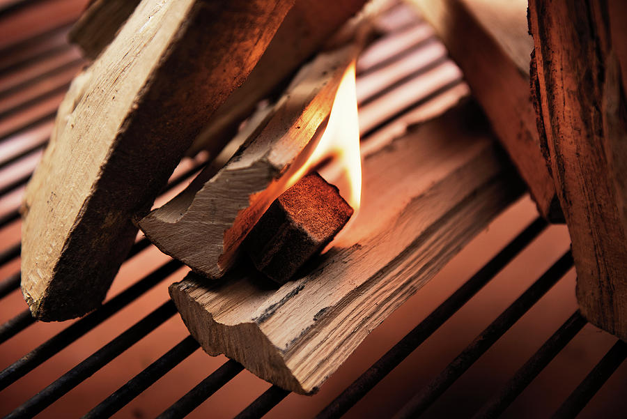 Burning Grill Lighter Between Logs Photograph by Torri Tre