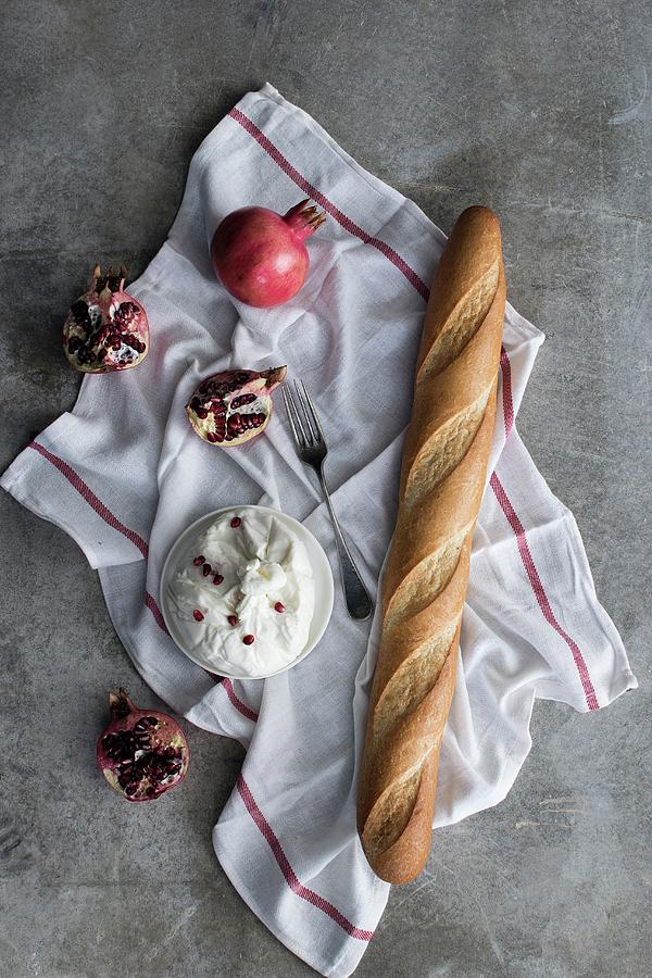 Burrata a Fresh Italian Cheese Made From Mozzarella And Cream Served With Baguette And Pomegranate Photograph by Justina Ramanauskiene