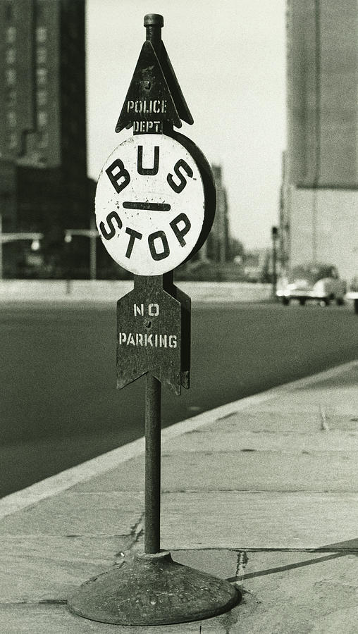 Bus Stop Sign On Sidewalk, B&w Photograph by George Marks