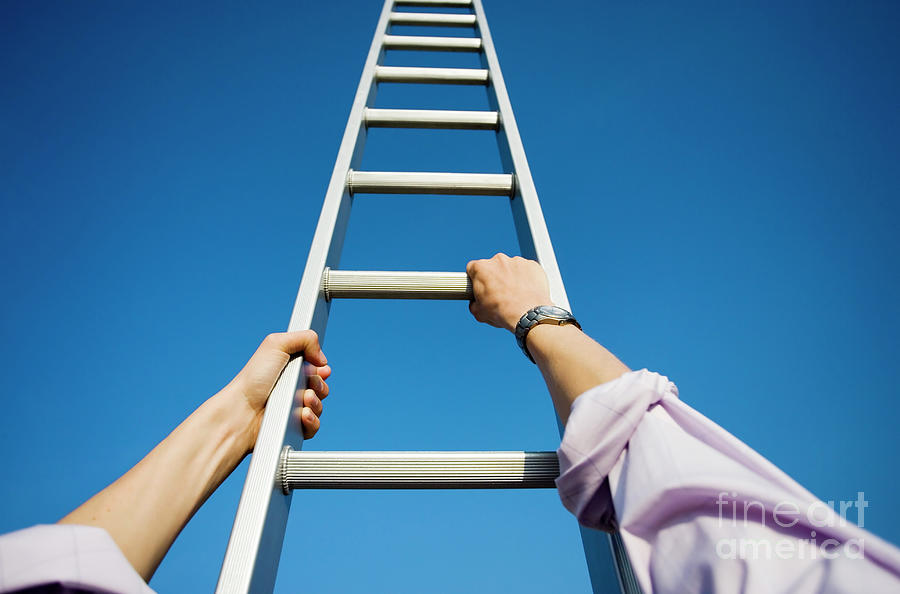Businessman Climbing A Ladder Photograph by Conceptual Images/science Photo Library
