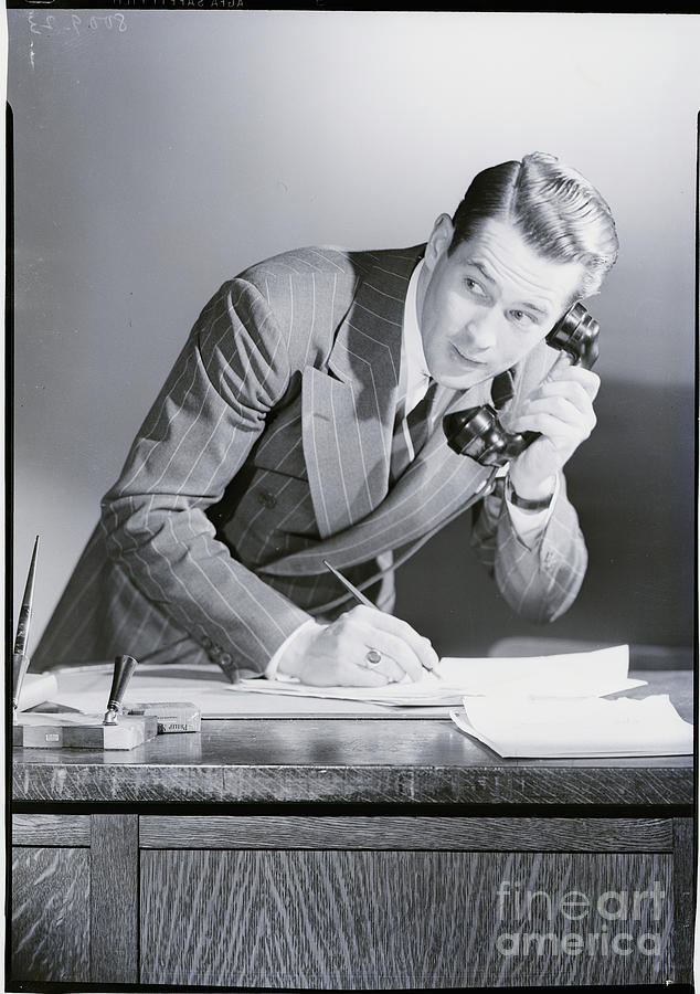 Businessman Talking On The Telephone Photograph by Bettmann
