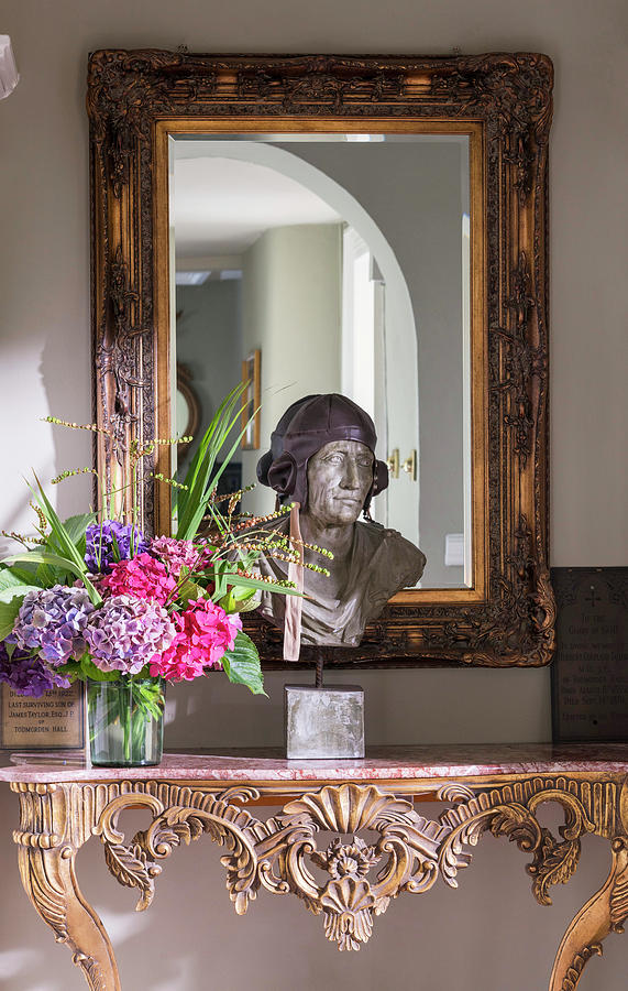 Bust And Vase Of Flowers On Carved, Antique Console Table Photograph by Brian Harrison