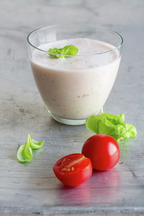 Buttermilk And Tomato Shake With Fresh Basil Photograph by Claudia Timmann