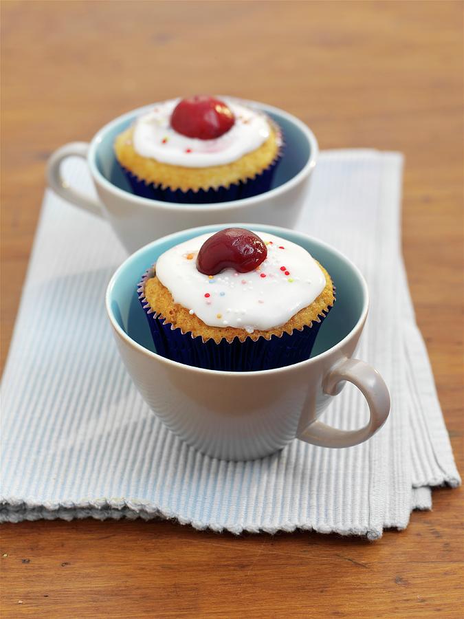 Buttermilk Cupcakes With Cherries Photograph by Garlick, Ian
